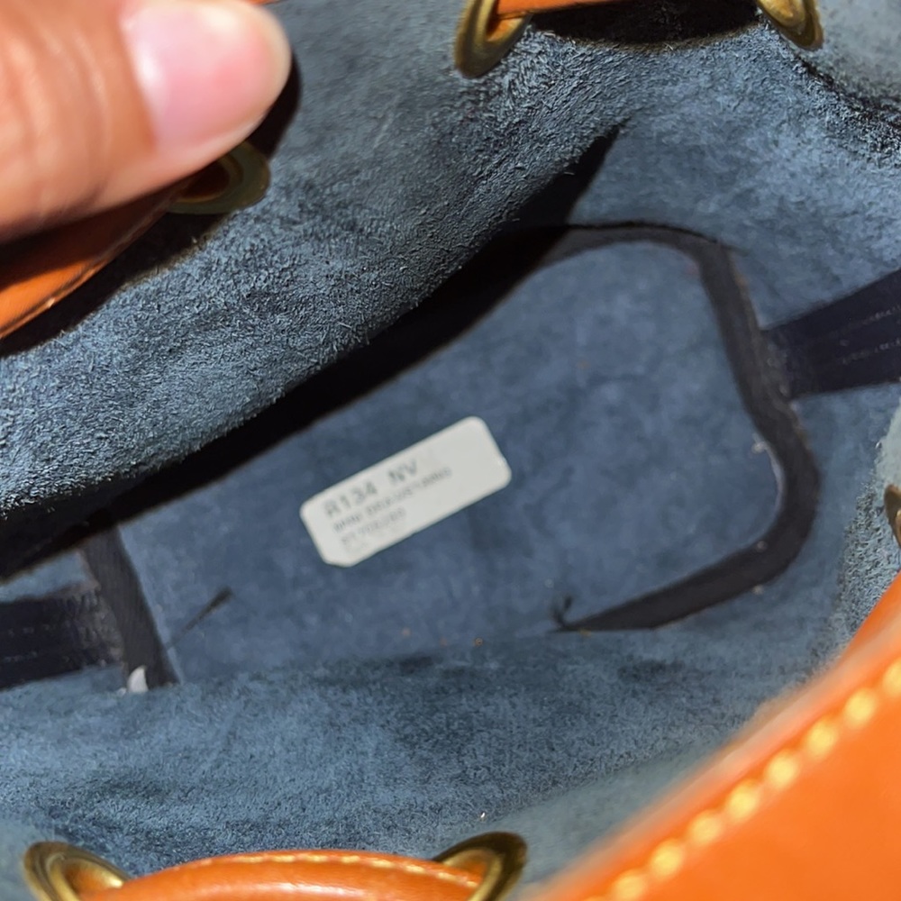 Dooney & Bourke Navy and Tan Pebbled Leather Drawstring Crossbody - Picture 6 of 9